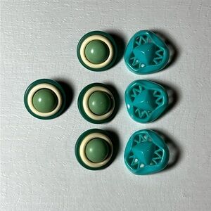 7 Vintage buttons, early plastic with shank backs, Turquoise mod pop art design